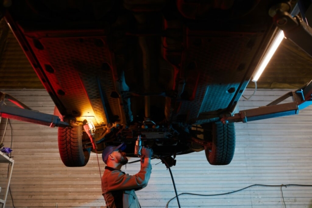 Auto Mechanic Under Car